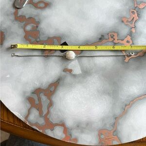 Elegant Silver and White Bracelet